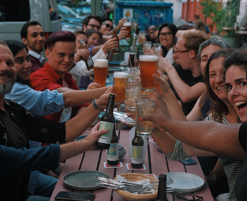 Team beers cheers in Kreuzberg with outdoor dinner